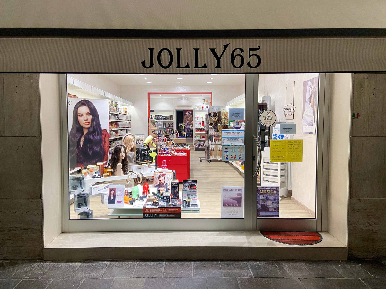 vetrina jolly65 negozio parrucchieri a guastalla